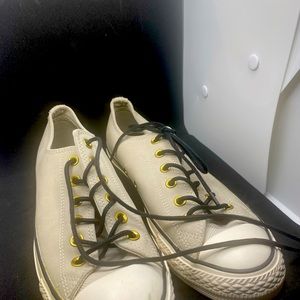 Grey leathered converse